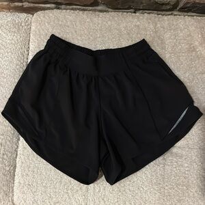 Lululemon Hotty Hot low rise 4” black EUC